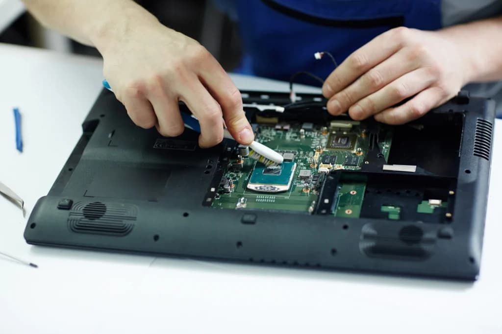 Laptop opened for component-level repair